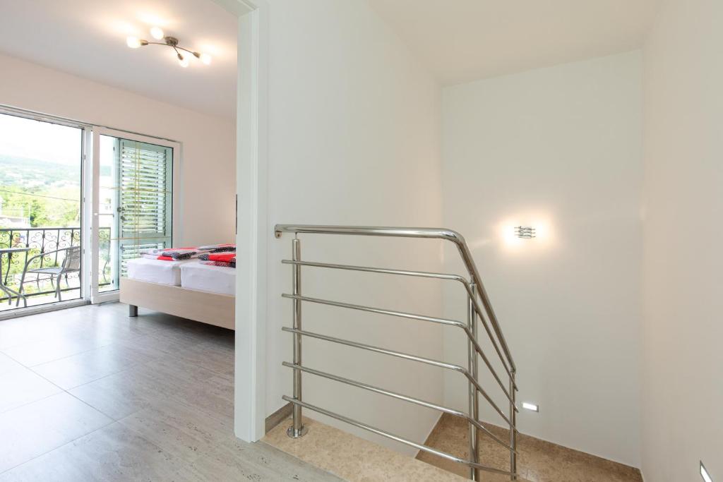 Postel nebo postele na pokoji v ubytování Ferienhaus Nikola