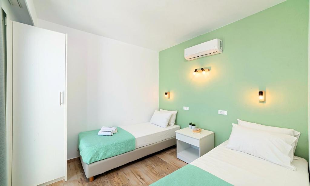 Posteľ alebo postele v izbe v ubytovaní Istron Homes