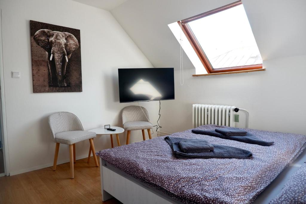 Postel nebo postele na pokoji v ubytování Kúzelná Špajza