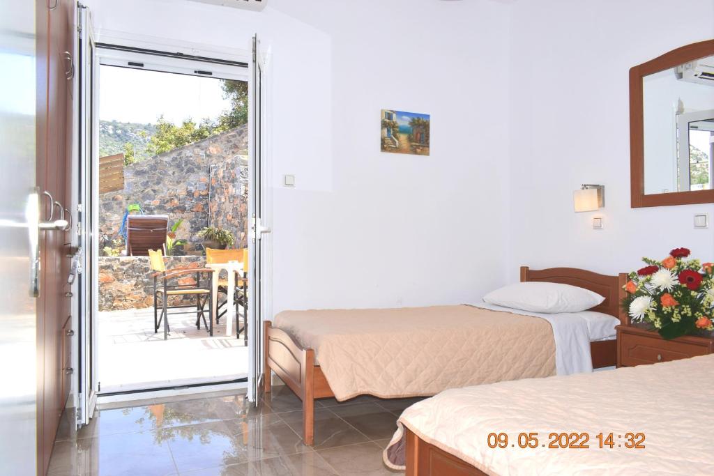 A bed or beds in a room at Istron MiraBella Villas