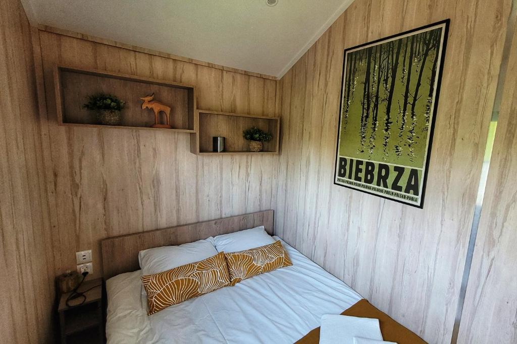 Posteľ alebo postele v izbe v ubytovaní Domek w Otulinie Biebrzy