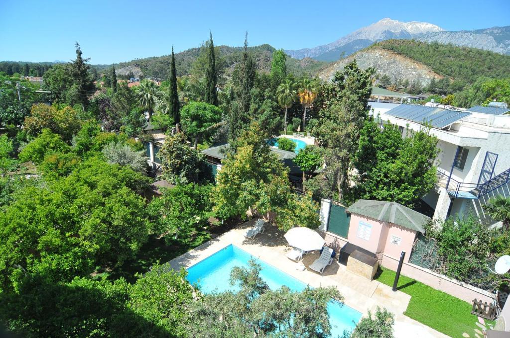 an aerial view of a house with a swimming pool at Likya Apart Hotel in Kemer