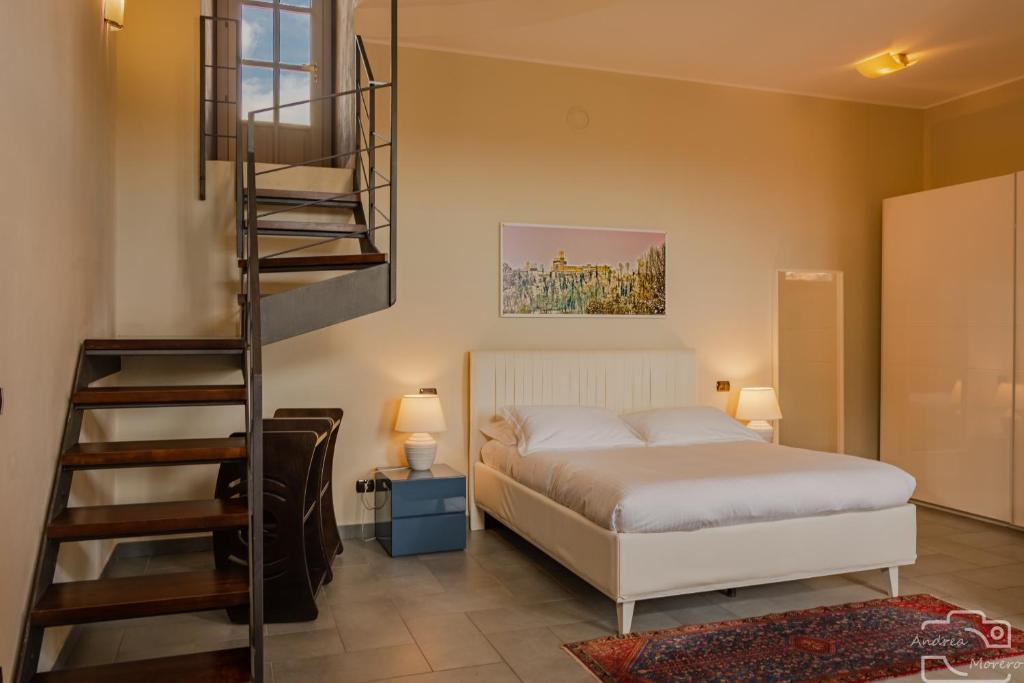 Postel nebo postele na pokoji v ubytování Hotel I Somaschi