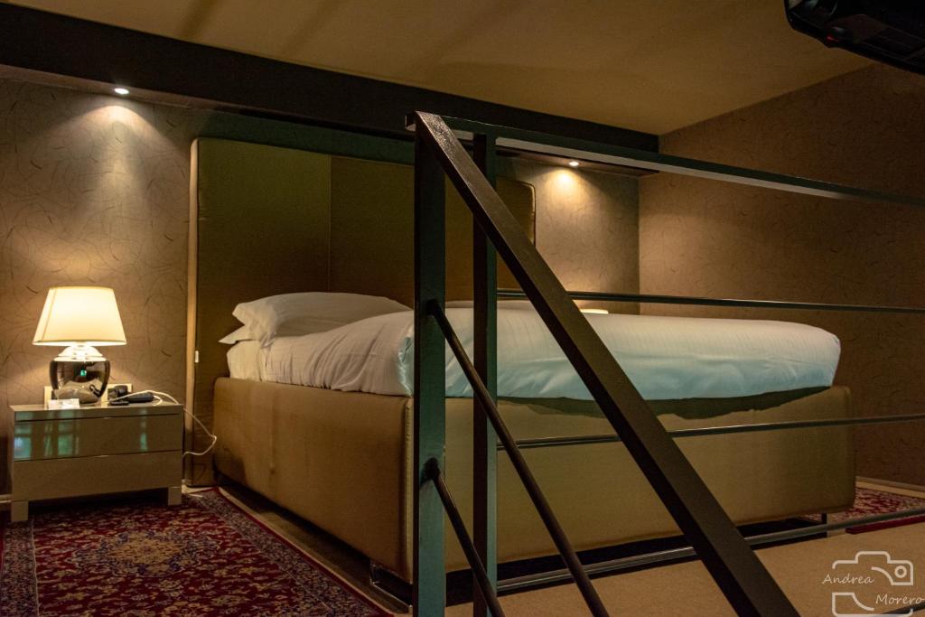 Postel nebo postele na pokoji v ubytování Hotel I Somaschi