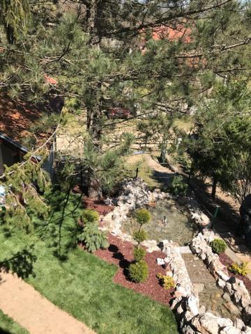 an overhead view of a garden with flowers and trees at Villa M in Vinci