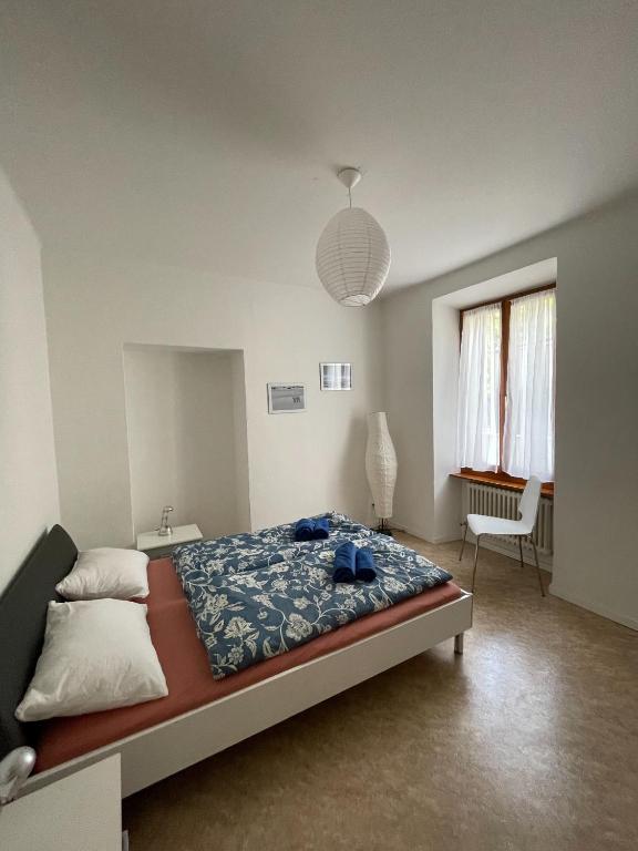 Postel nebo postele na pokoji v ubytování Residence Gaggiole, apartment 2