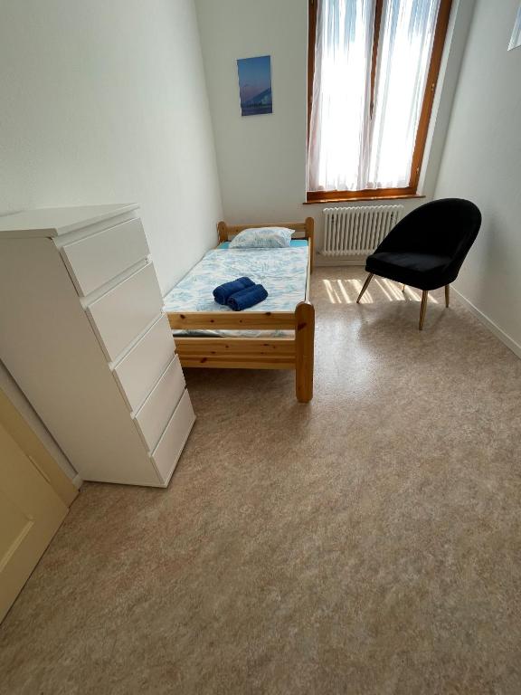 Postel nebo postele na pokoji v ubytování Residence Gaggiole, apartment 2
