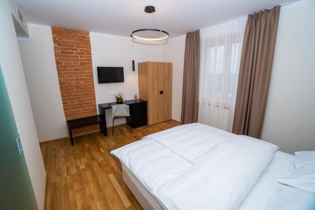 Postel nebo postele na pokoji v ubytování Hiša Pep's