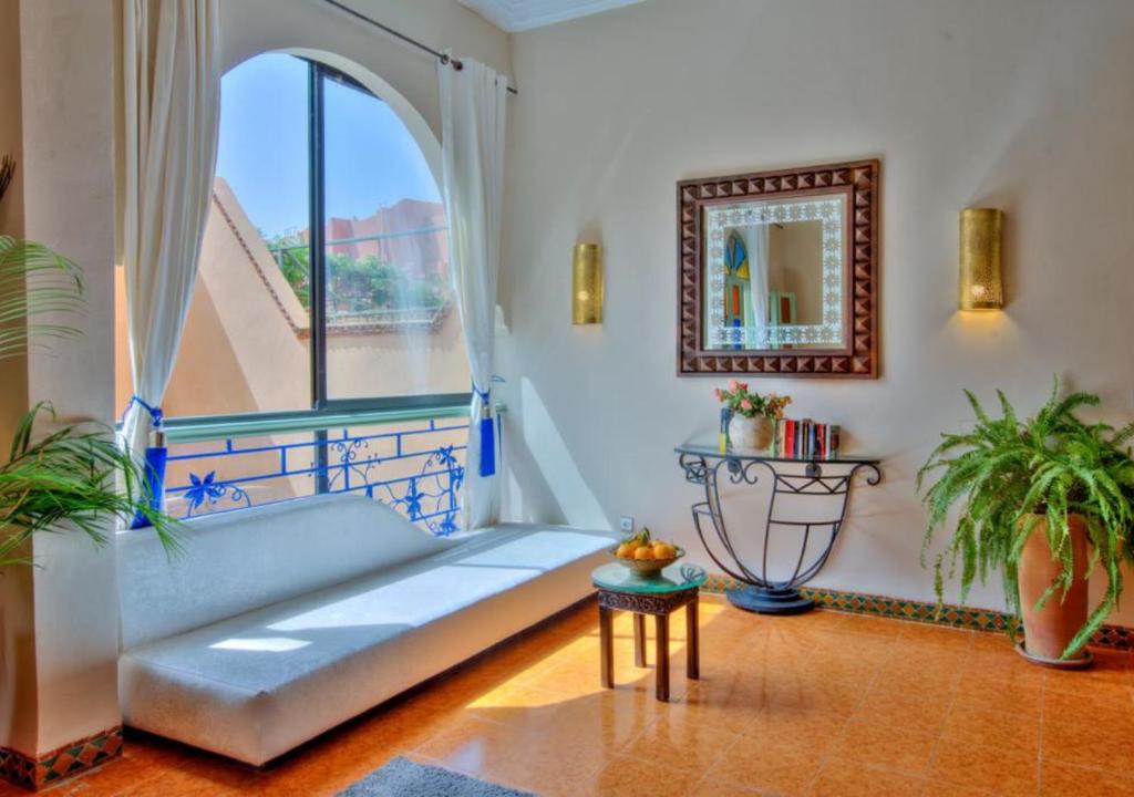 Postel nebo postele na pokoji v ubytování Riad la villa bleue & SPA