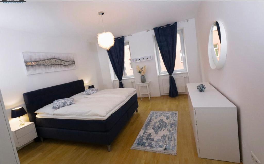 Postel nebo postele na pokoji v ubytování Elegante Unterkunft l BG7