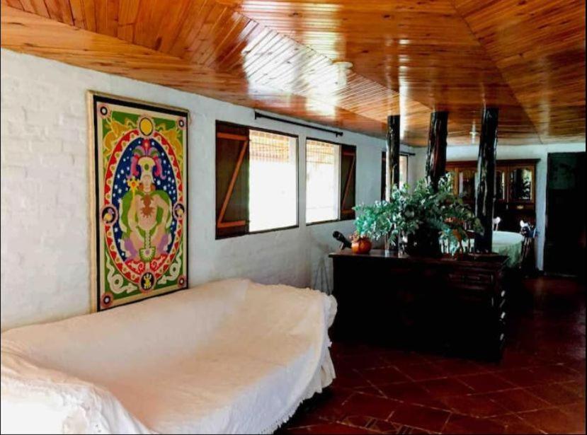 Cama o camas de una habitación en Increíble finca en felidia