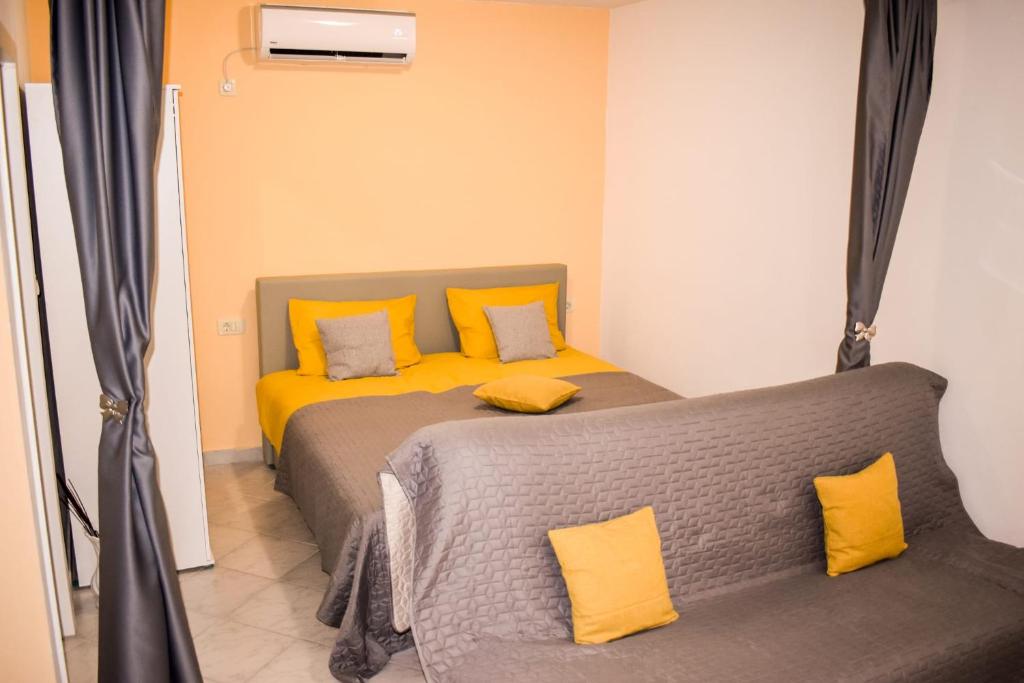 Posteľ alebo postele v izbe v ubytovaní Studio apartman Moreno