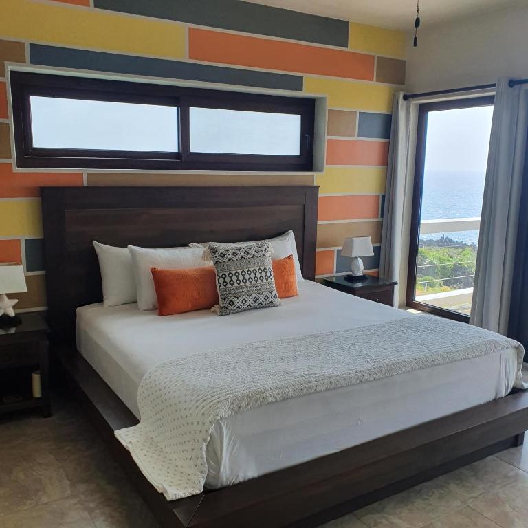 Postel nebo postele na pokoji v ubytování Fishers Landing Boutique Hotel
