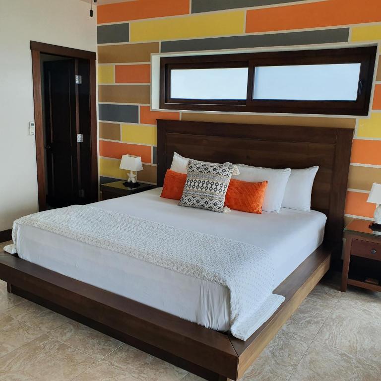 Postel nebo postele na pokoji v ubytování Fishers Landing Boutique Hotel