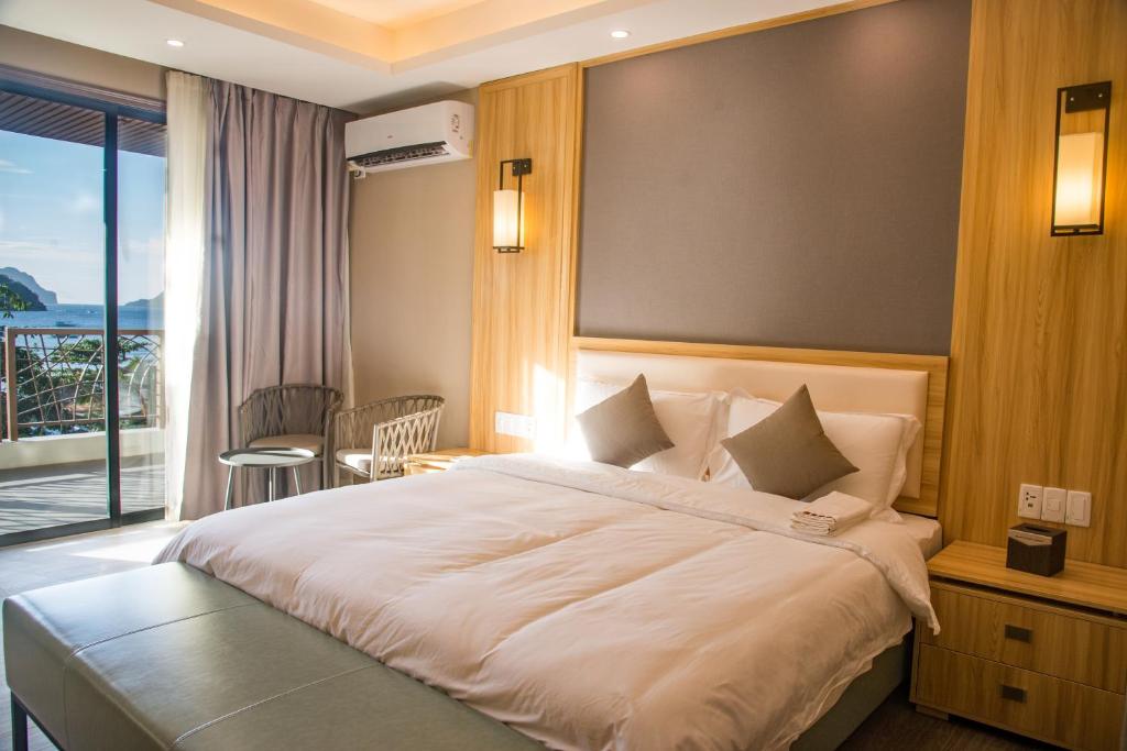 Postel nebo postele na pokoji v ubytování El Nido Garden Resort
