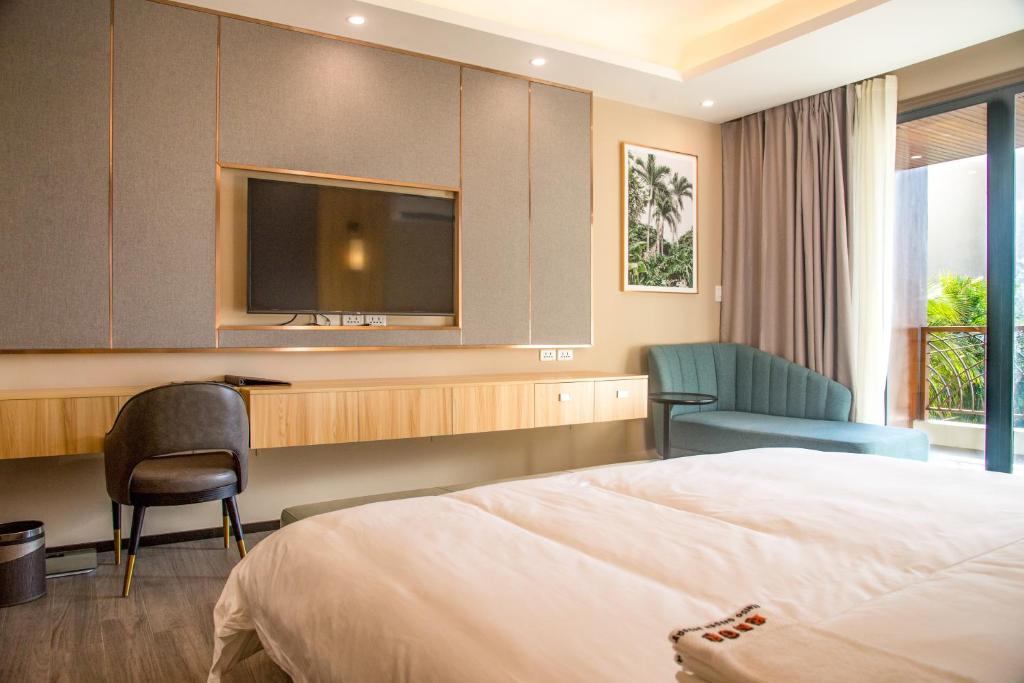 Postel nebo postele na pokoji v ubytování El Nido Garden Resort