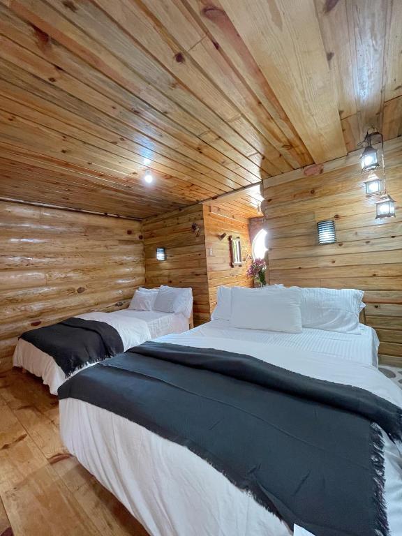 Uma cama ou camas num quarto em The Shire of Sagada