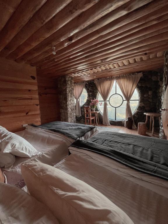 Uma cama ou camas num quarto em The Shire of Sagada