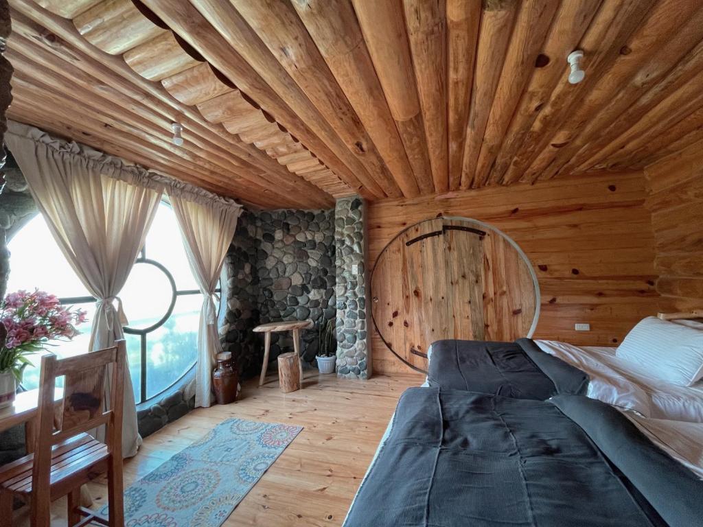 Uma cama ou camas num quarto em The Shire of Sagada