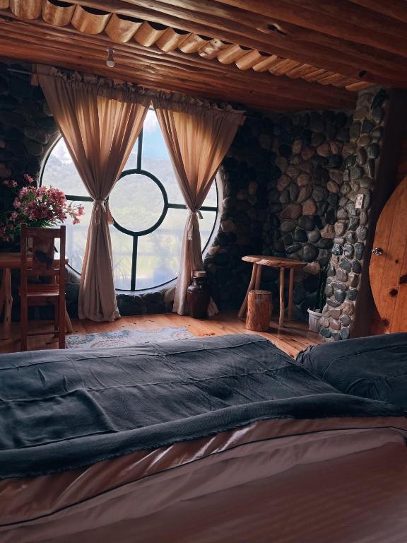 Uma cama ou camas num quarto em The Shire of Sagada
