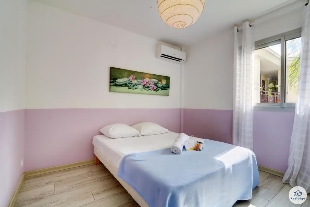 Postel nebo postele na pokoji v ubytování Cap Ouest 3 étoiles