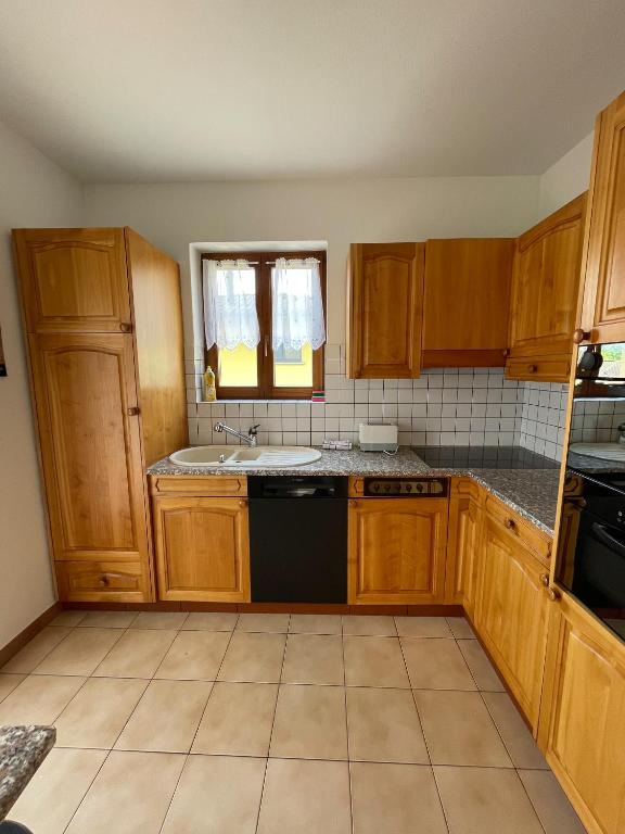 Kuchyň nebo kuchyňský kout v ubytování Residence Gaggiole, apartment 2