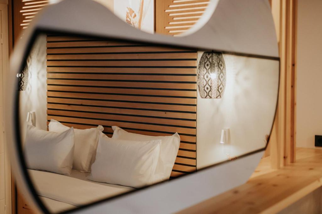 Voodi või voodid majutusasutuse Somnus Suites Parga toas