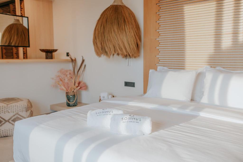 Voodi või voodid majutusasutuse Somnus Suites Parga toas