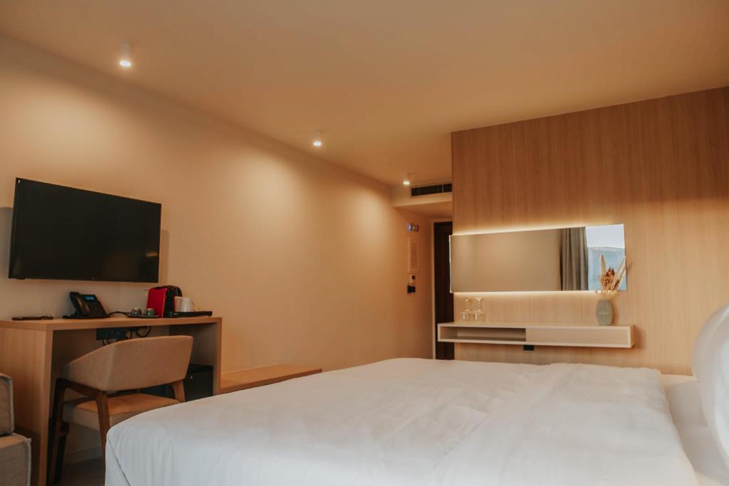 Voodi või voodid majutusasutuse Somnus Suites Parga toas