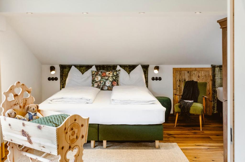 Postel nebo postele na pokoji v ubytování Seehotel Berau