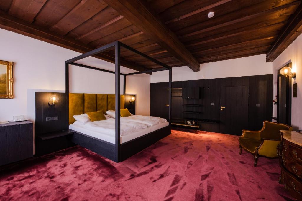 Letto o letti in una camera di Villa Conti