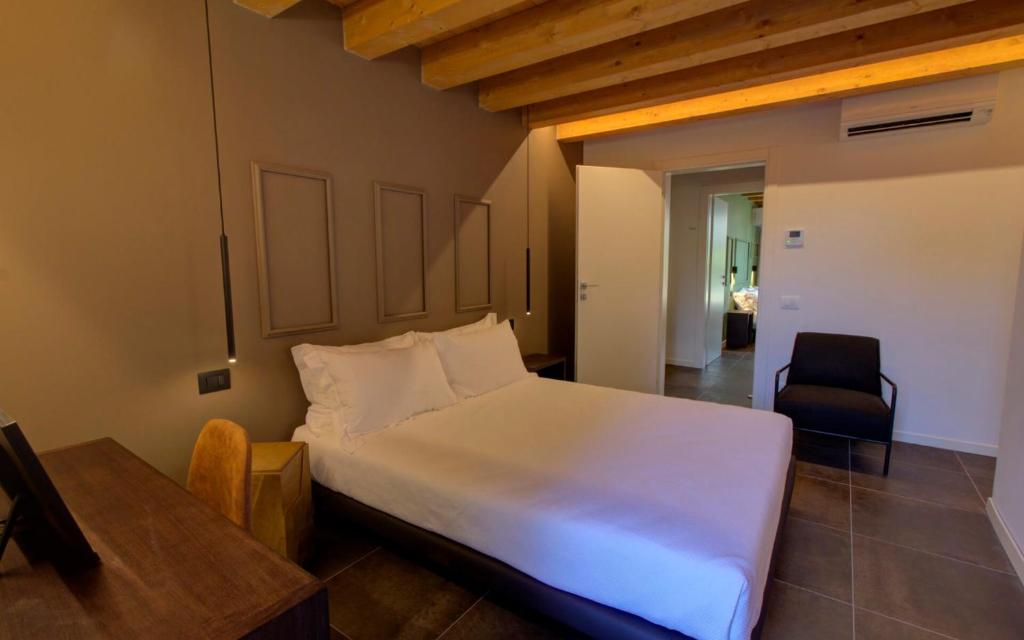Postel nebo postele na pokoji v ubytování Nuovo B&B WhyNot? a Vicenza