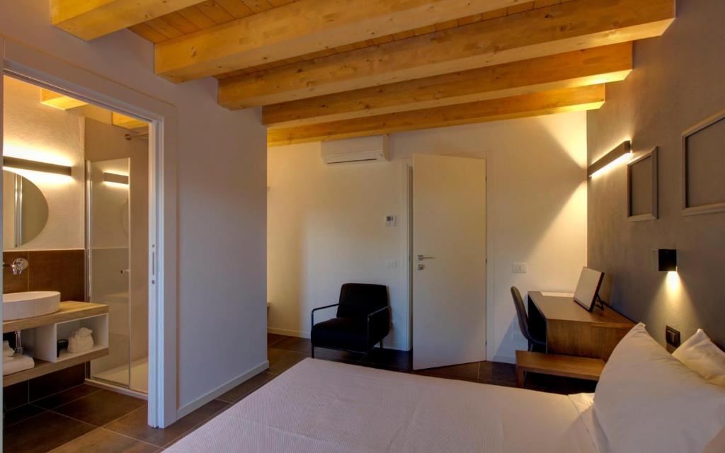 Postel nebo postele na pokoji v ubytování Nuovo B&B WhyNot? a Vicenza