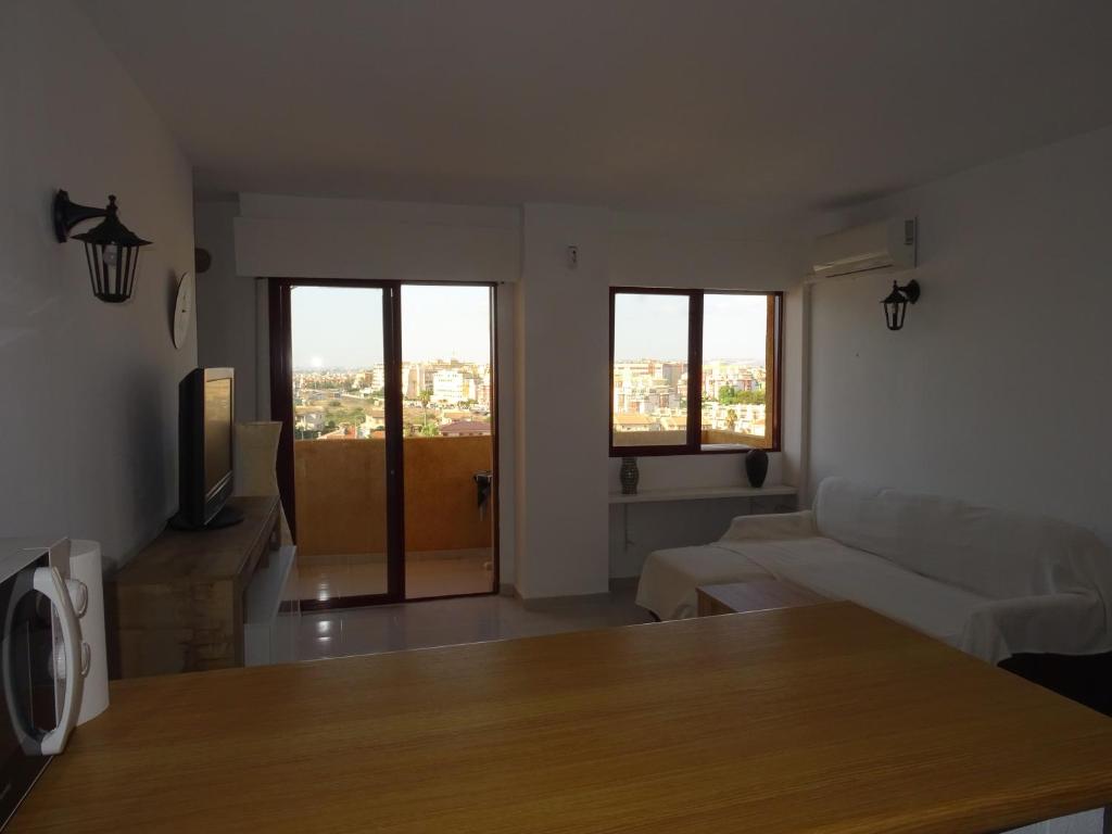 Postel nebo postele na pokoji v ubytování Apartamento Torrenueva La Mata Impresionantes vistas