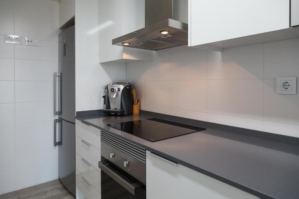 Kuchyň nebo kuchyňský kout v ubytování UHC Salou Residencial