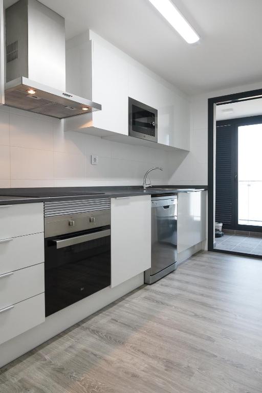 Kuchyň nebo kuchyňský kout v ubytování UHC Salou Residencial