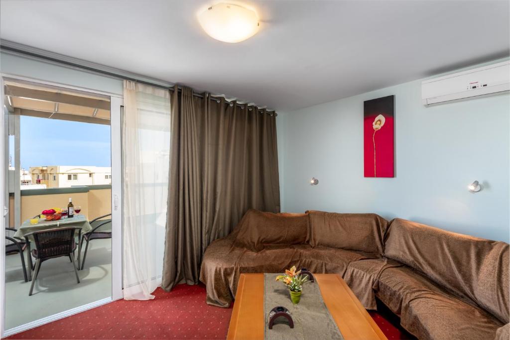 Posezení v ubytování Comfort Hotel Apartments