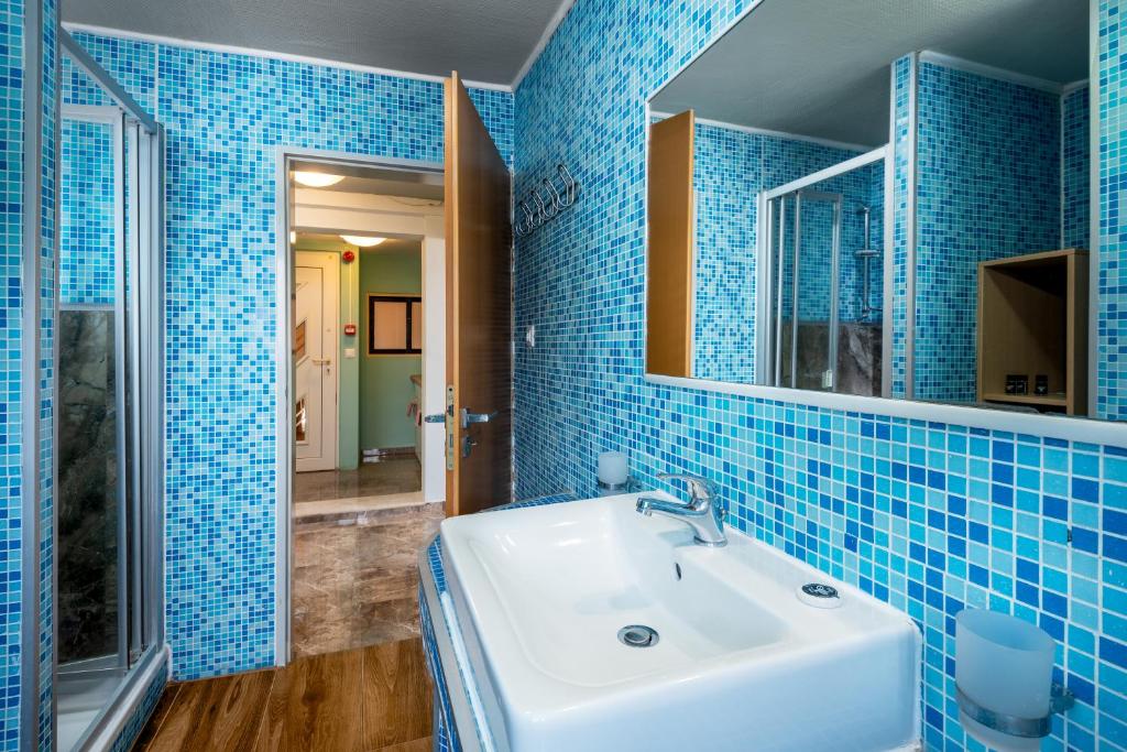 Koupelna v ubytování Comfort Hotel Apartments