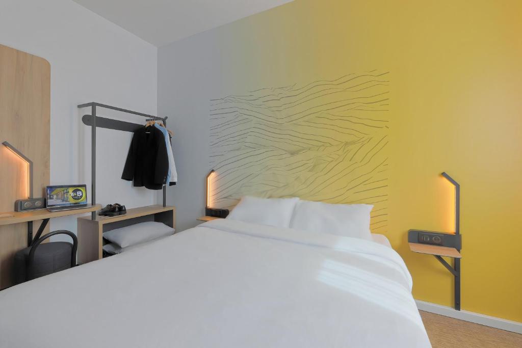 Postel nebo postele na pokoji v ubytování B&B HOTEL Le Touquet