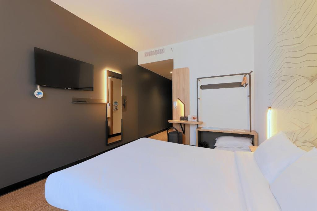 Postel nebo postele na pokoji v ubytování B&B HOTEL Le Touquet