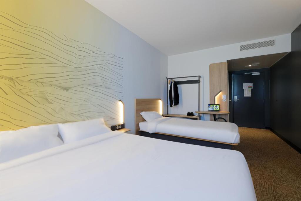 Postel nebo postele na pokoji v ubytování B&B HOTEL Le Touquet
