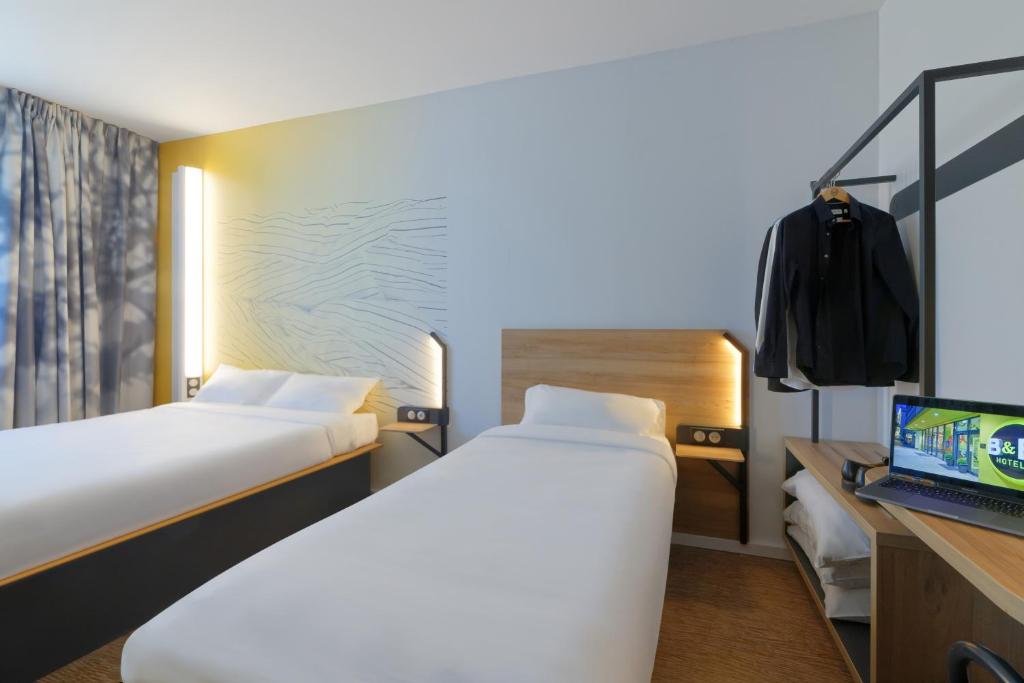 Postel nebo postele na pokoji v ubytování B&B HOTEL Le Touquet