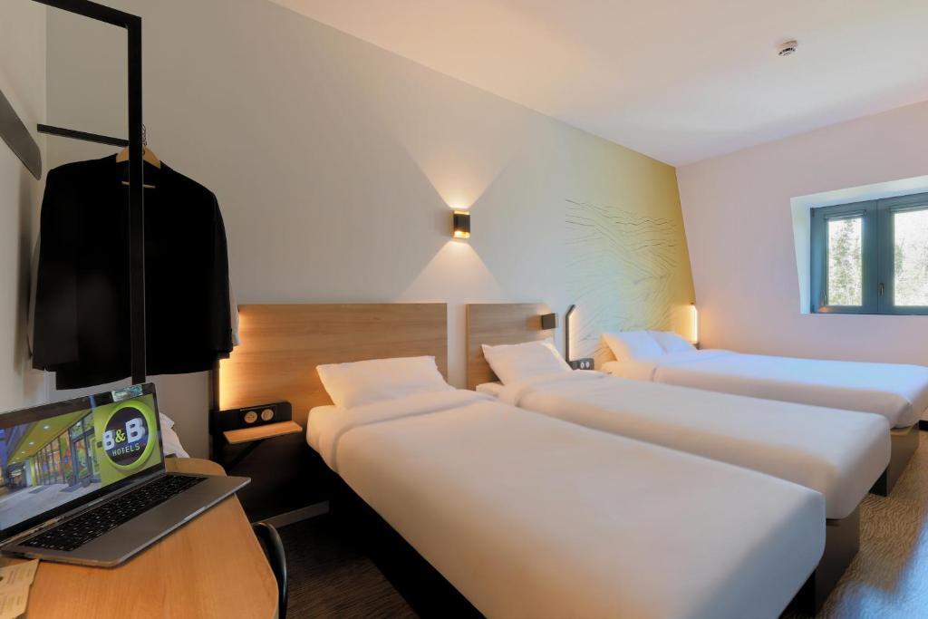 Postel nebo postele na pokoji v ubytování B&B HOTEL Le Touquet