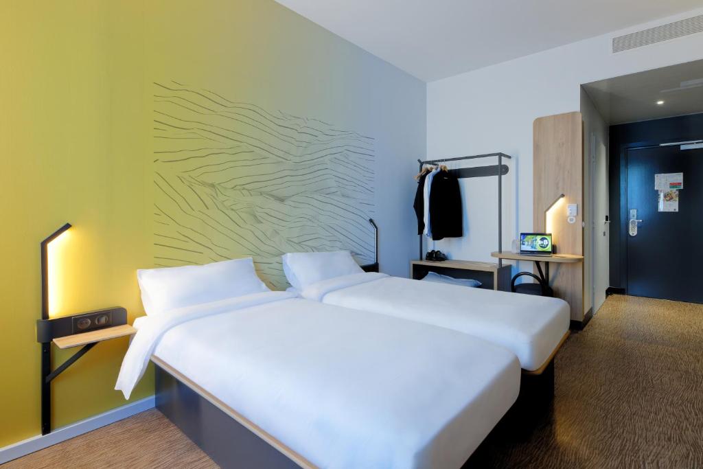 Postel nebo postele na pokoji v ubytování B&B HOTEL Le Touquet