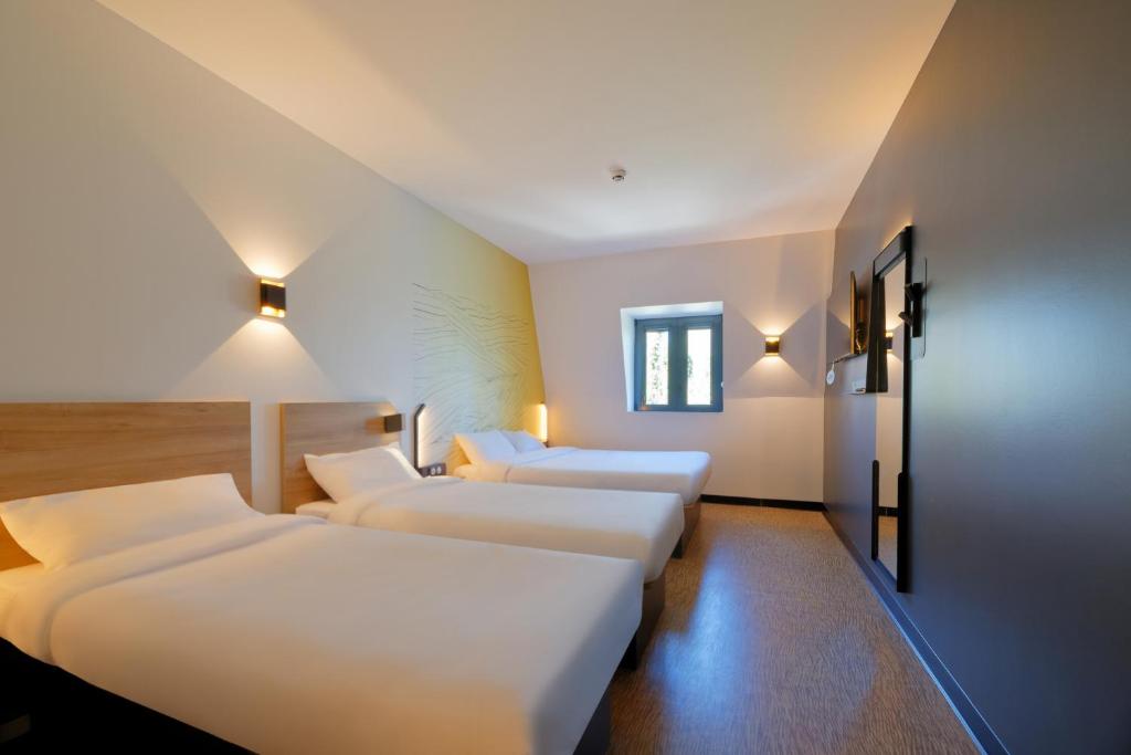 Postel nebo postele na pokoji v ubytování B&B HOTEL Le Touquet