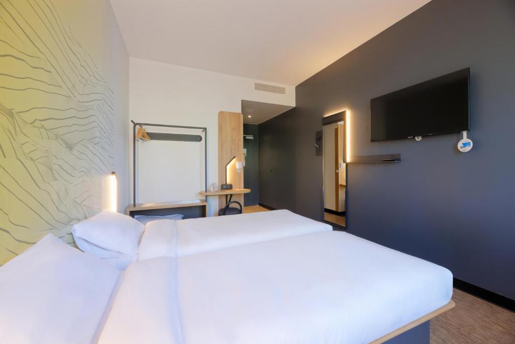 Postel nebo postele na pokoji v ubytování B&B HOTEL Le Touquet