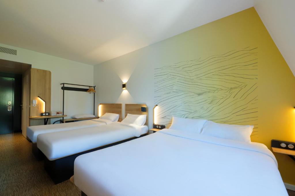 Postel nebo postele na pokoji v ubytování B&B HOTEL Le Touquet