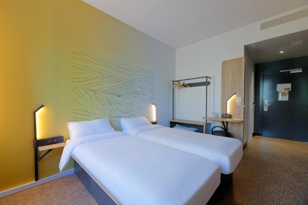 Postel nebo postele na pokoji v ubytování B&B HOTEL Le Touquet