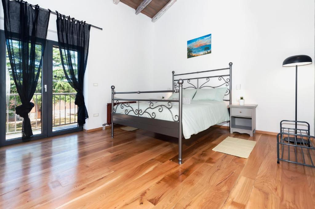 Posteľ alebo postele v izbe v ubytovaní Villa Baraka with private pool near Rovinj - WiiBuk
