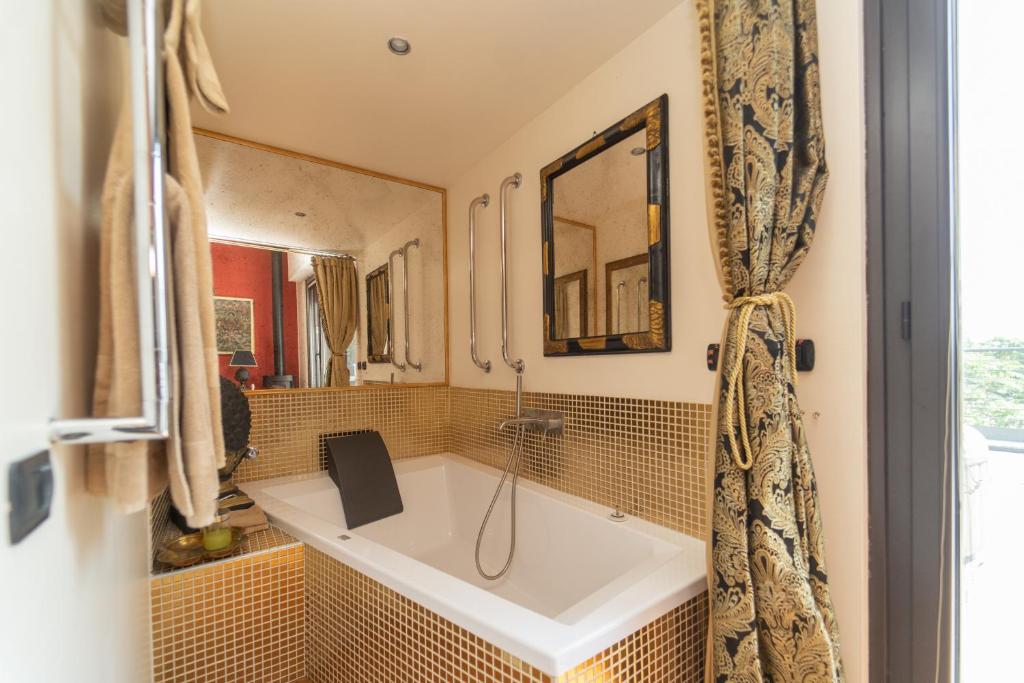 Ванна кімната в Spazio Prestige